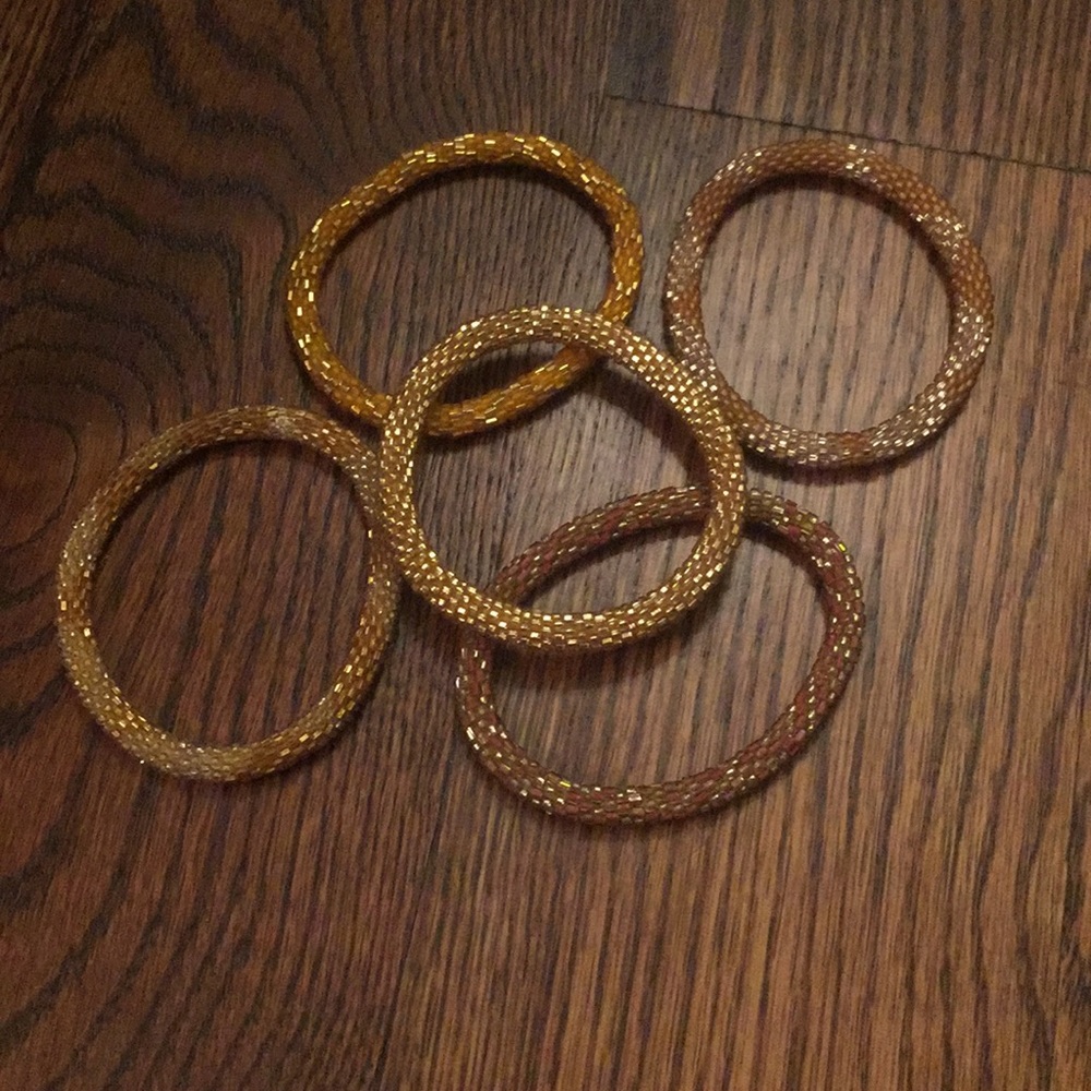 Beaded roll on bracelets. Gold tones.